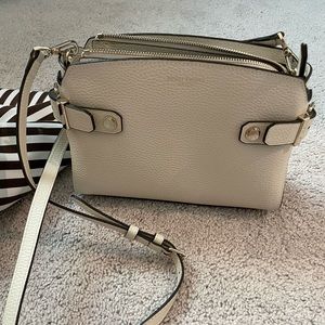 henri bendel crossbody bag with adjustable strap on white/cream